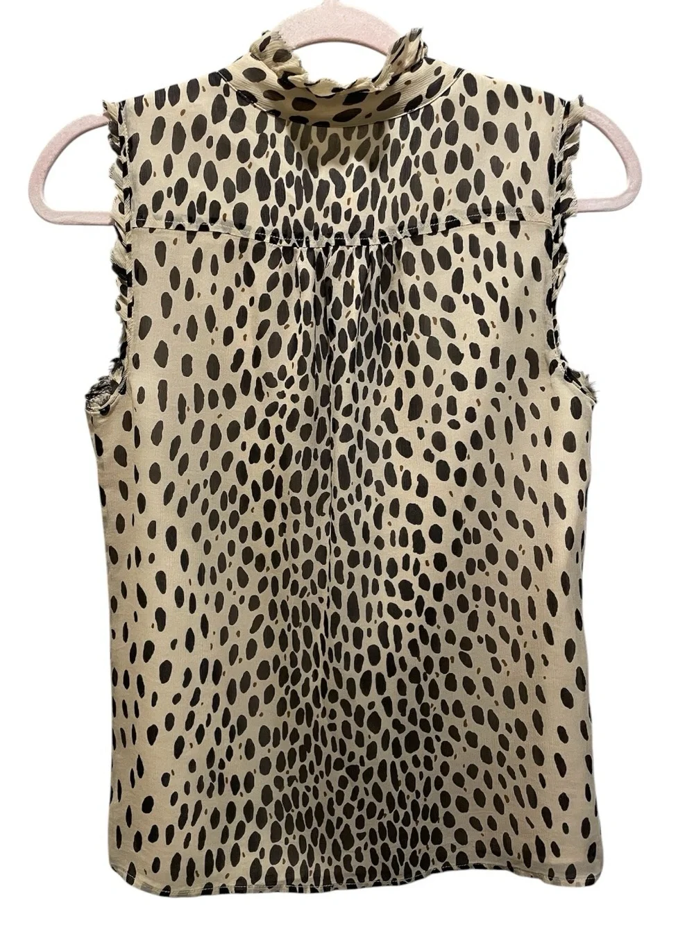 J.Crew silk blouse features a sleeveless design and a cheetah print. Size 2.
